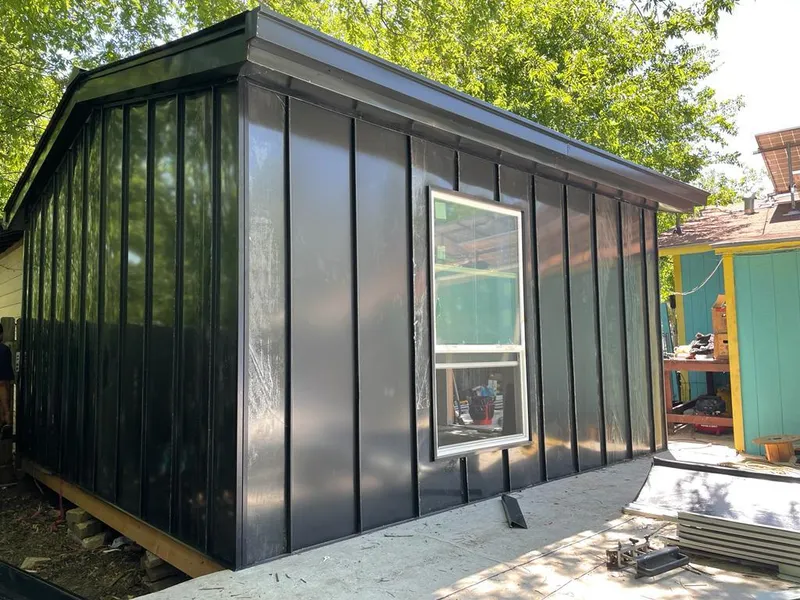 Black standing seam metal wall panels for Roof Inspection in South St. Paul