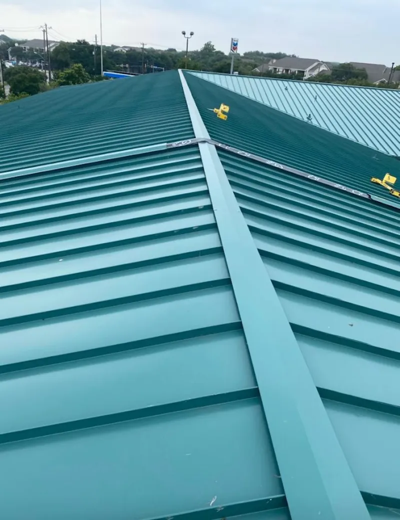 Green commercial metal roof ridge and valley for Metal Roof Repair in South St. Paul