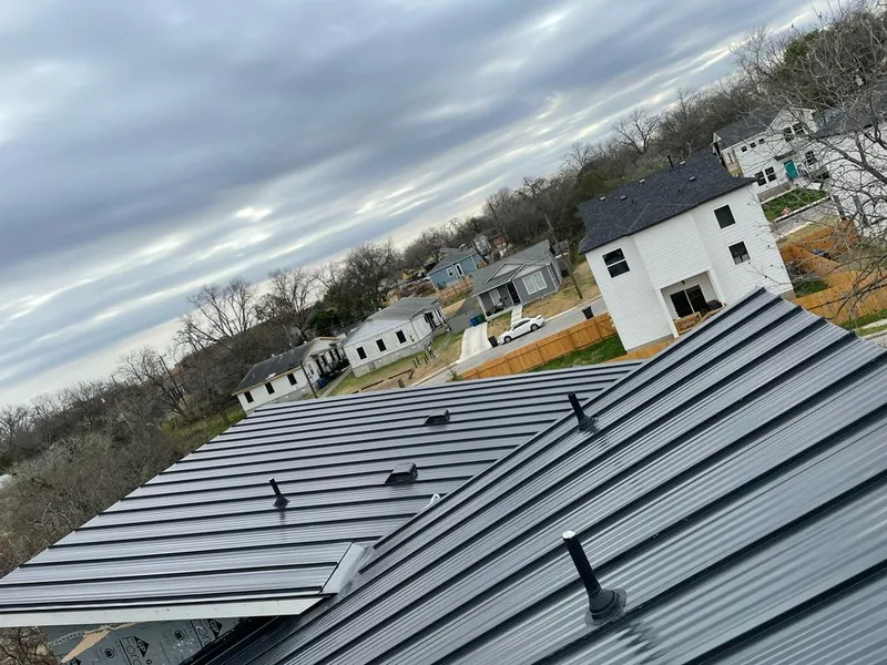 Standing seam metal roof panels with vents for Skylight Repair in South St. Paul